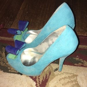 Peep toe suede heels